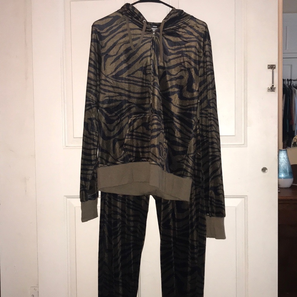Two piece velour jumpsuit. Animal print two piece